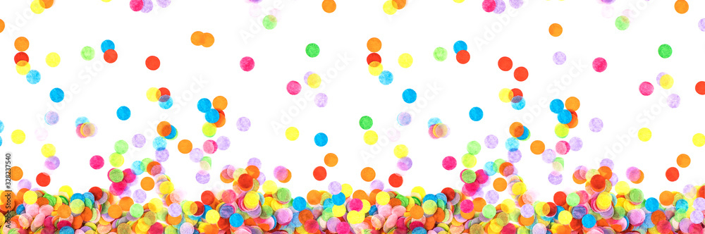 Banner made from bright multicolored confetti isolated on a white background. Festive concept. Children's party, birthday, wedding, celebration. Top view. Copy space.