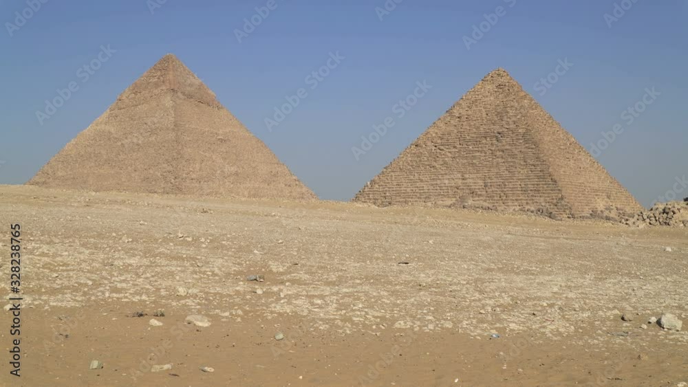 The Pyramid of Khafre or Chephren and the Pyramid of Menkaure located on the Giza Plateau in greater Cairo, Egypt The Pyramid of Khafre or Chephren and the Pyramid of Menkaure located on the Giza Plateau in greater Cairo, Egypt