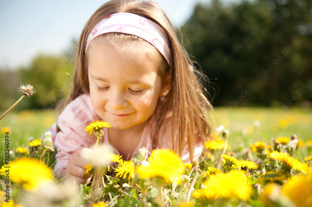 Cute little girl on a meadow Cute little girl on a meadow