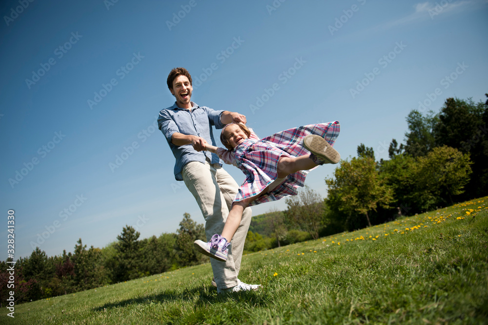 Happy family. Father with child in a park. Happy family. Father with child in a park.