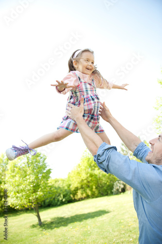 Happy family. Father with child in a park.