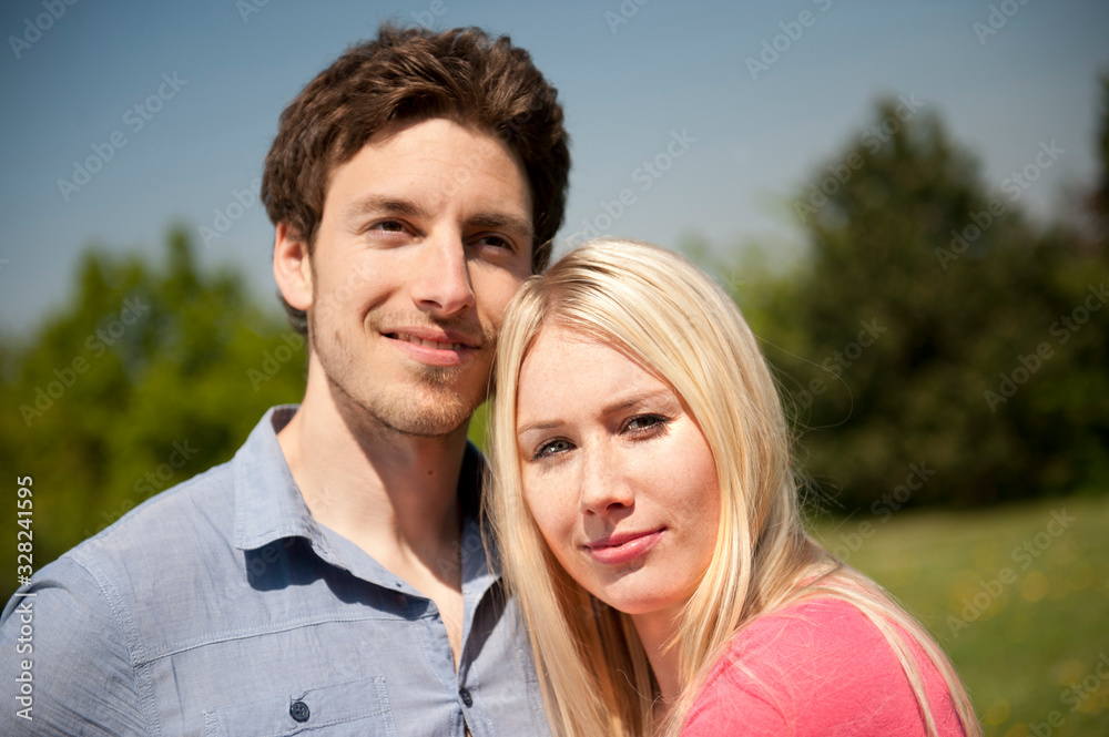 Happy young couple in love on a meadow Happy young couple in love on a meadow