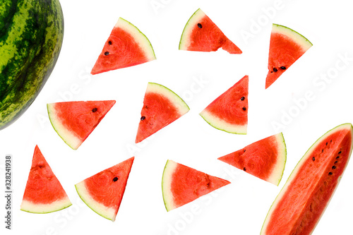 Small pieces of Watermelon slice and Watermelon balls in the corner of the image isolated on white background.