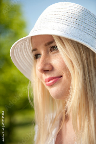 Happy young woman in a park