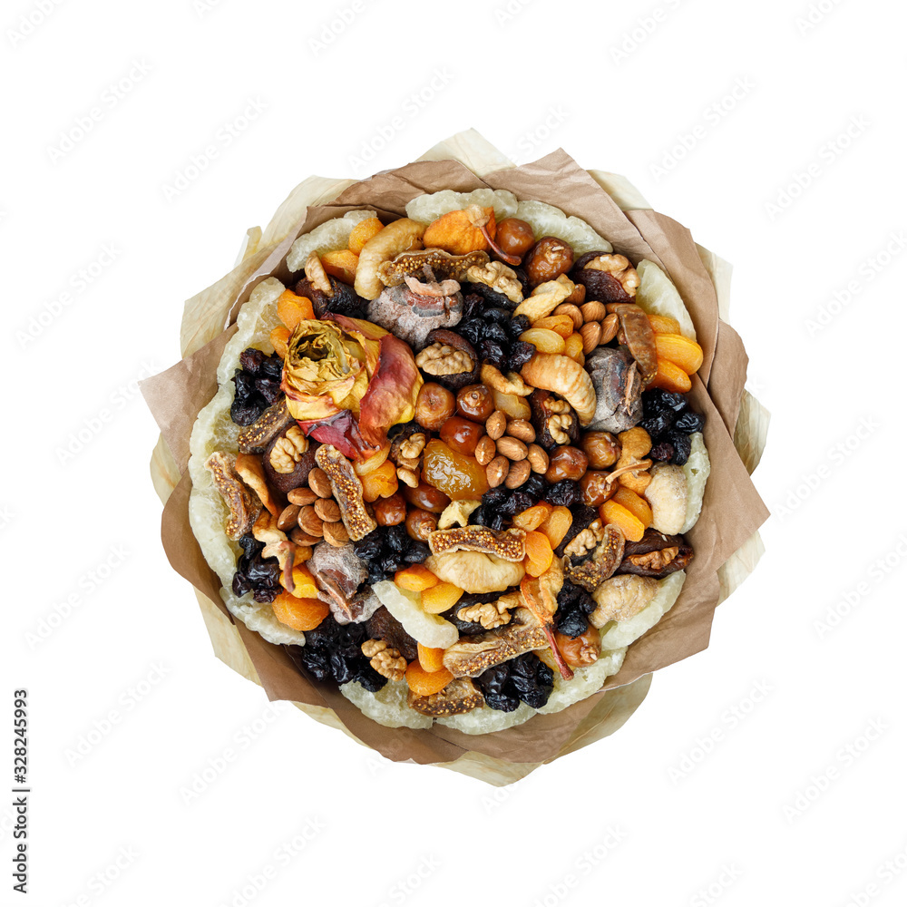 Bouquet of dried fruits, almonds and waxed roses as a gift on a white background Bouquet of dried fruits, almonds and waxed roses as a gift on a white background
