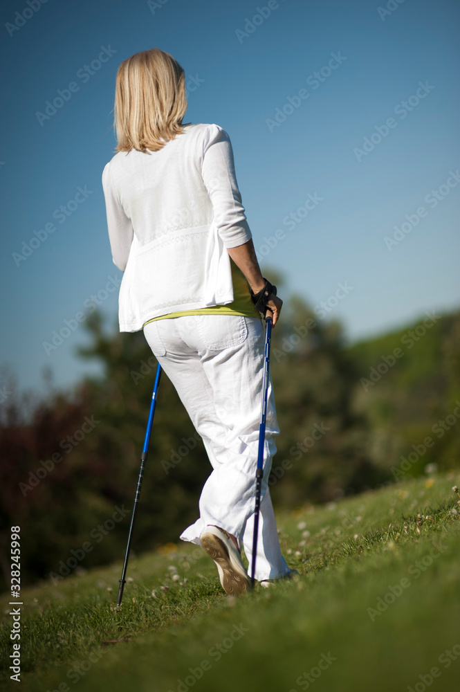 Happy senior woman in a park