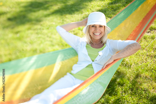 Happy senior woman in a park