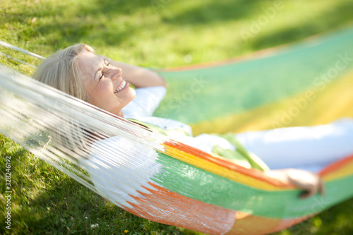 Happy senior woman in a park