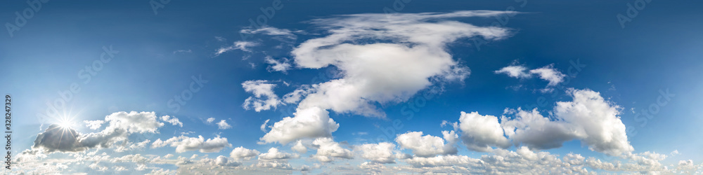 Obraz premium Seamless hdri panorama 360 degrees angle view blue sky with beautiful cumulus clouds with zenith for use in 3d graphics or game development as sky dome or edit drone shot