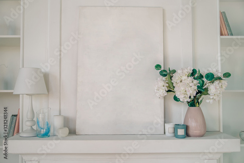 Spring Mockup with frame and flowers. © Olha Cheverda