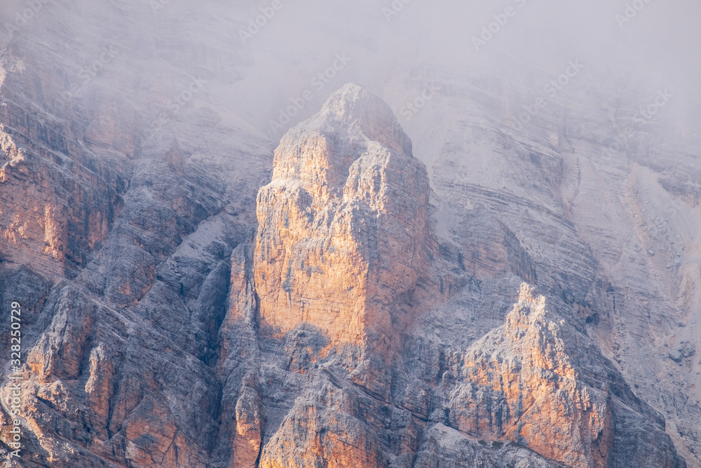 Lagazuoi Mountains above clouds around Averau and Pelmo Mountains, Belluno Province at Dolomites Italian Alps Lagazuoi Mountains above clouds around Averau and Pelmo Mountains, Belluno Province at Dolomites Italian Alps