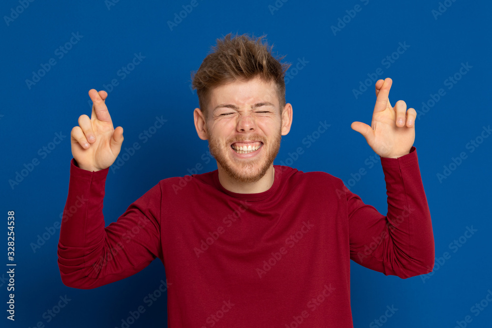 Attractive young guy with a red T-shirt Attractive young guy with a red T-shirt