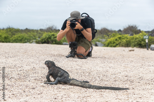 Photography Animal wildlife nature photographer and tourist taking picture of Galapagos Chri