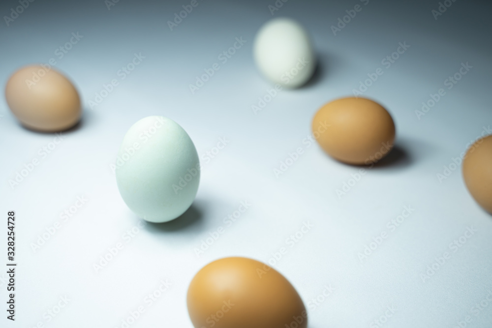 Many eggs are in a white table. Many eggs are in a white table.