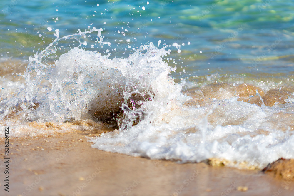 Sea spray on the shore close-up Sea spray on the shore close-up