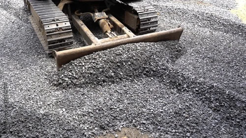 Dozers are leveling the area for the construction or repair of rural roads background.