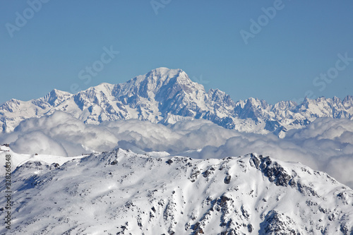 Val Thorens, France - February 18, 2020: Winter Alps landscape from ski resort Val Thorens. Mont Blanc is the highest mountain in the Alps and the highest in Europe