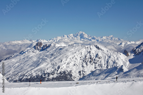 Val Thorens, France - February 18, 2020: Winter Alps landscape from ski resort Val Thorens. Mont Blanc is the highest mountain in the Alps and the highest in Europe