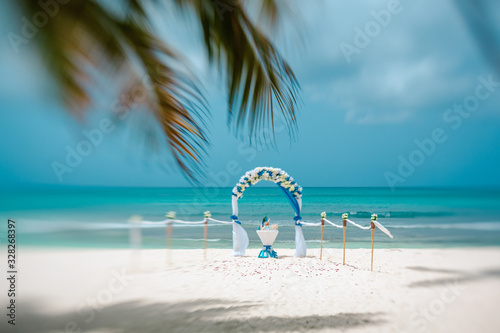 Wedding arch on the beach, artistic blur, lensbaby