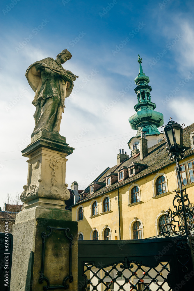 Ancient sculpture of Jan Nepomucky near Michal Gate in Bratislava, Slovakia