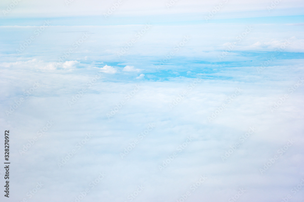 Fluffy white clouds against the blue sky