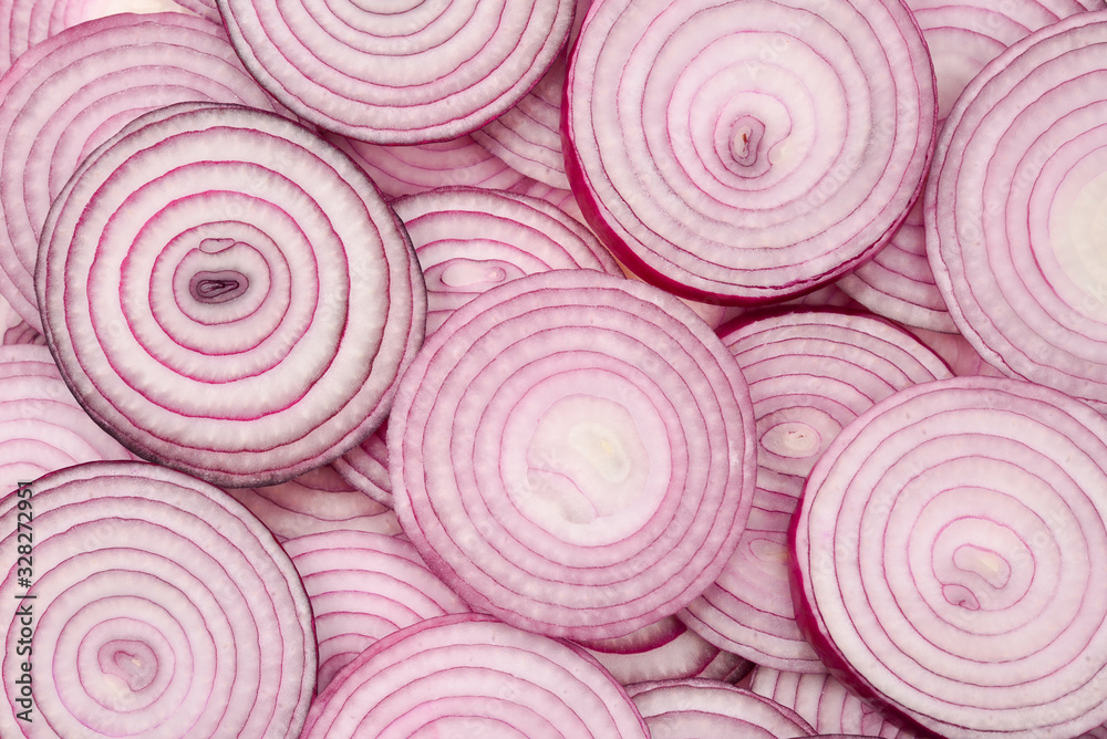 Onion slices as a background. Top view. Onion slices as a background. Top view.