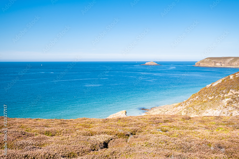 Landscape of the Brittany coast in the Cape Frehel region with its beaches, rocks and cliffs in summer.