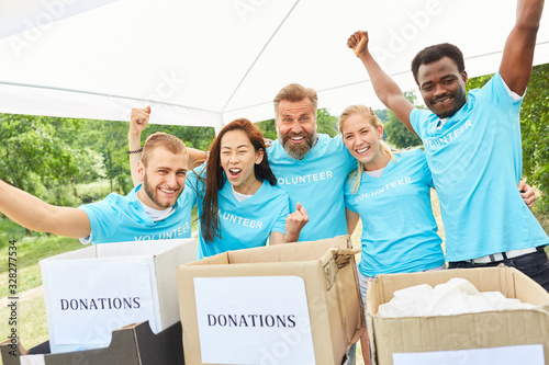 Volunteers cheer at a fundraiser photo