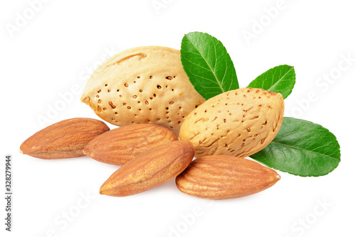 almonds with green leaves isolated on white background