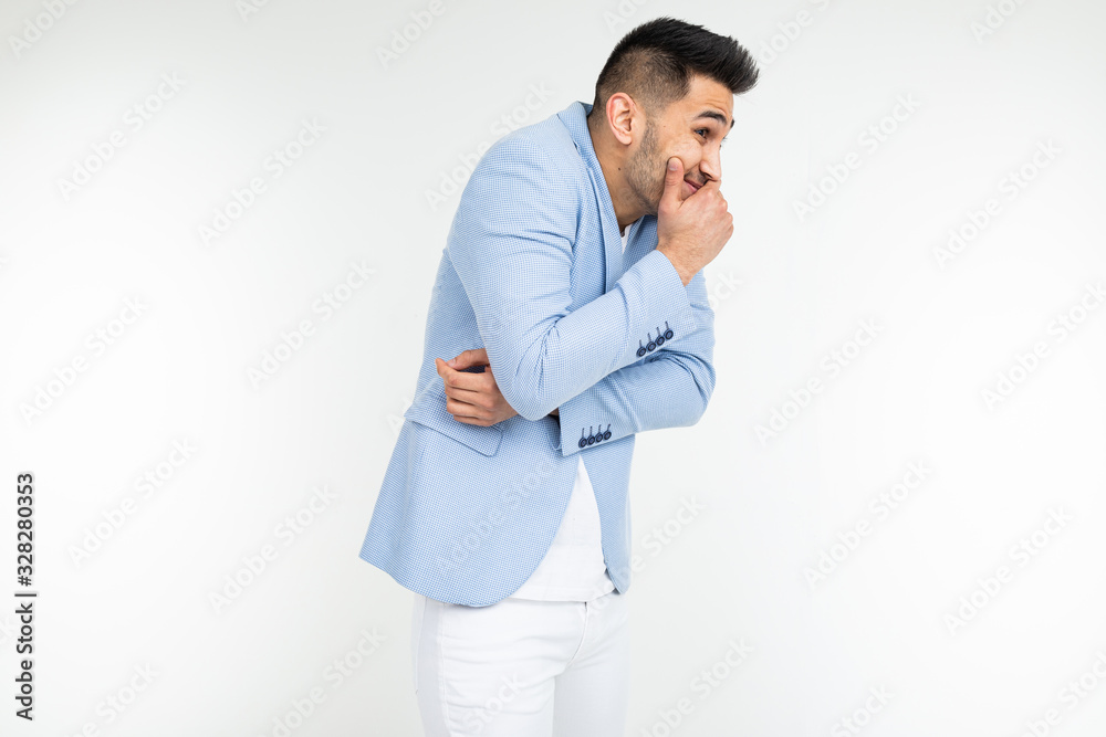 funny gentleman covers his mouth with his hand on a white studio background funny gentleman covers his mouth with his hand on a white studio background