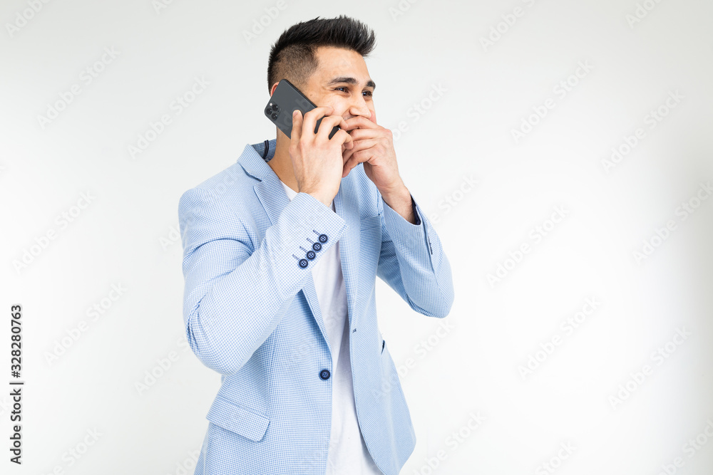 portrait of a decent man laughing chatting on the phone portrait of a decent man laughing chatting on the phone