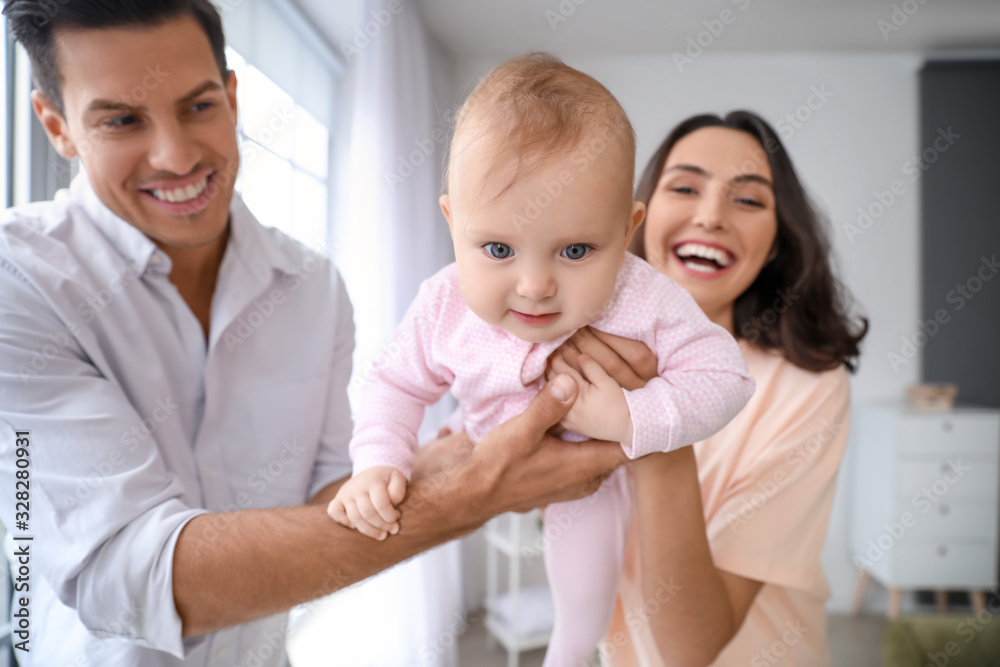 Cute baby with parents at home - obrazy, fototapety, plakaty 
