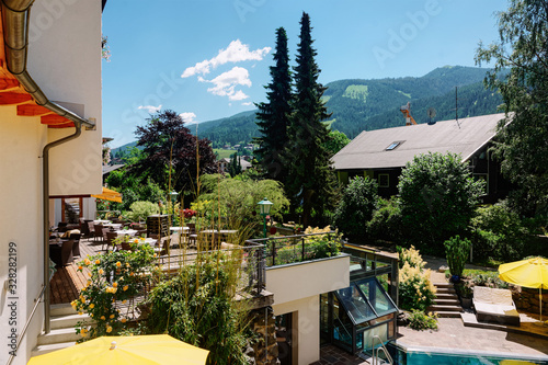 Street restaurant with tables and chairs at Bad Kleinkirchheim of Austria photo