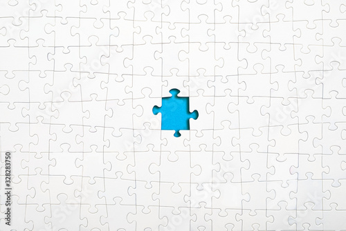 Картината върху платно Business concept of white jigsaw puzzle.