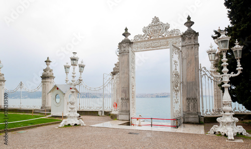 Bosporus, Istanbul, Dolmabahce palace with ottoman columns of fence and gate