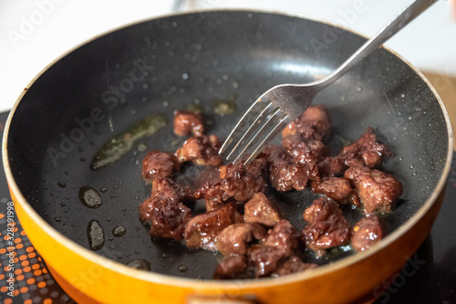 The process of cooking beef