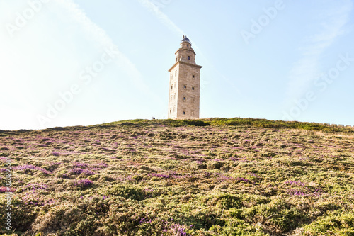 lighthouse in mountains, photo as a background , in a coruna north spain, galicia, spain, europe , tower of hercules lighthouse
