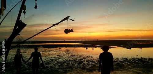 silhouette of man on beach