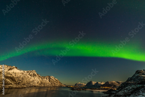 unforgettable aurora borealis  northern lights  over mountains in the North of Europe - Lofoten islands  Norway