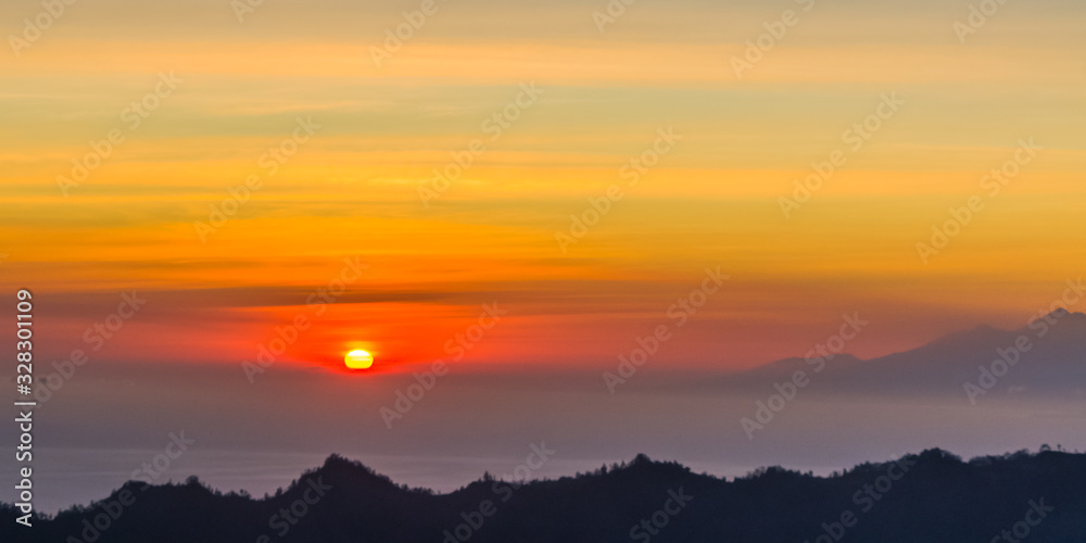 Sunrise panorama view from top of Batur volcano Sunrise panorama view from top of Batur volcano
