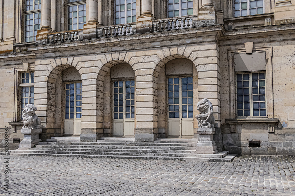Architectural fragments of medieval (XII century) landmark – old royal hunting castle Fontainebleau. Fontainebleau Palace - one of largest royal chateaux in France (55 km from Paris).