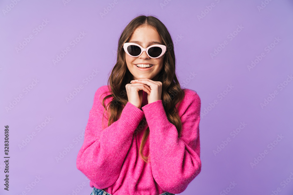 Image of young beautiful woman wearing sunglasses smiling at camera Image of young beautiful woman wearing sunglasses smiling at camera