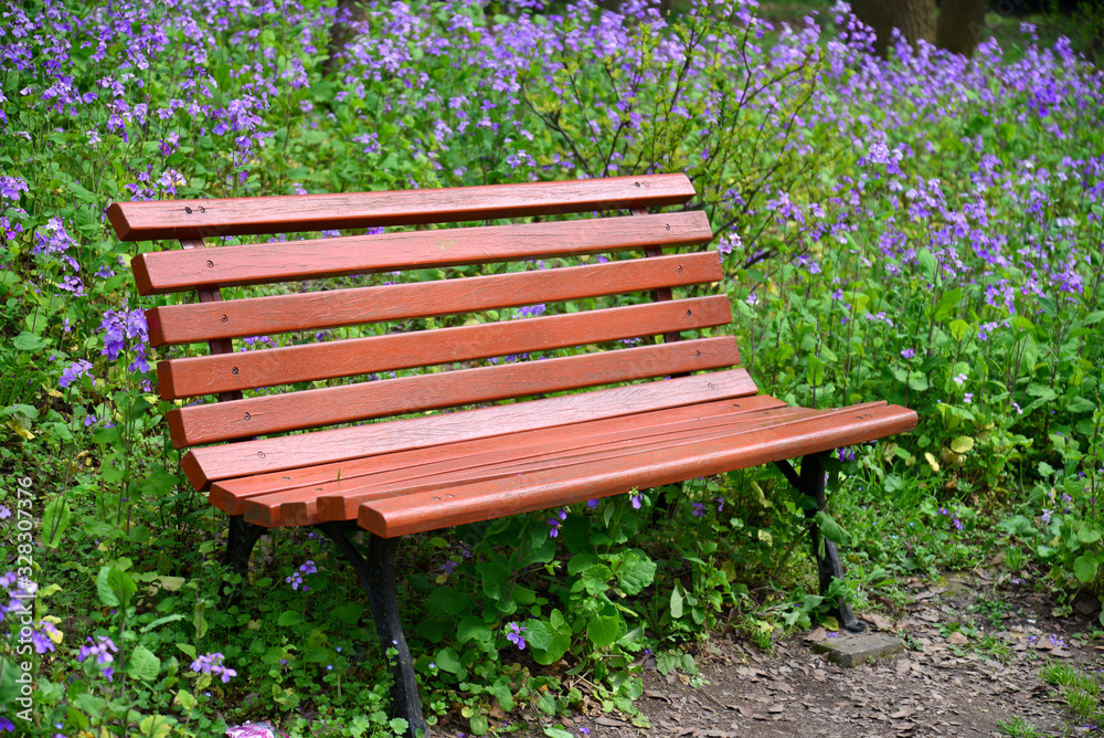 Flowers, trees and benches in urban country parks in spring Flowers, trees and benches in urban country parks in spring