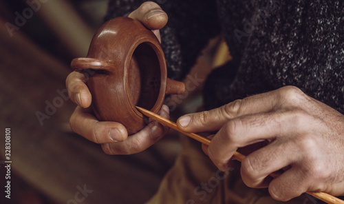 Potter Makes A Traditional Chinese Teapot From Yixing Clay. Handmade Clay Teapot For Chinese Tea Ceremony. Purple Sand Teapot. High Quality Photo