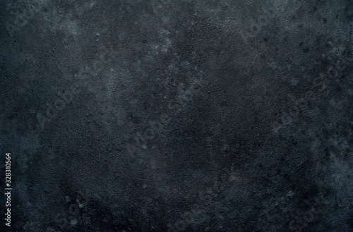 Grilled beef steak over meat knife with spices and a bottle  the fault  , decorative Easter eggs. View from above. on a stone background. Easter celebration concept