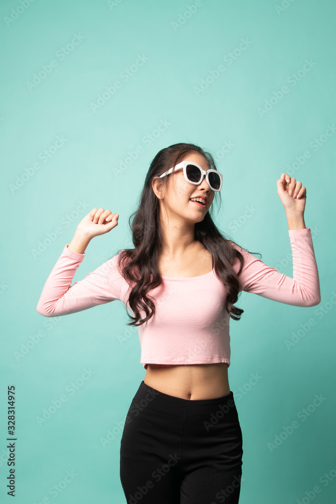 Portrait of a beautiful young asian girl in sunglasses. Portrait of a beautiful young asian girl in sunglasses.