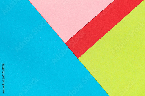 Abstract geometric background from sheets of thick colorful paper
