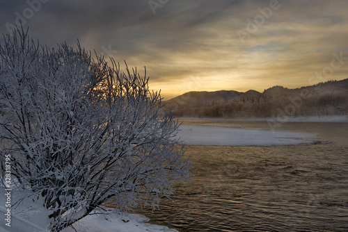 Russia. Mountain Altai  early winter morning in the village of Kebezen on the Bank of the Biya river