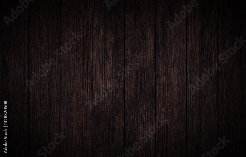 Old grunge dark textured wooden background, top view brown paneling. Vintage