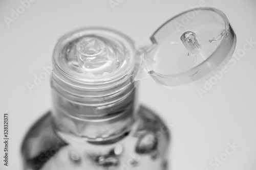 Close-up of hand cleaning gel bottle top. Health & safety. 